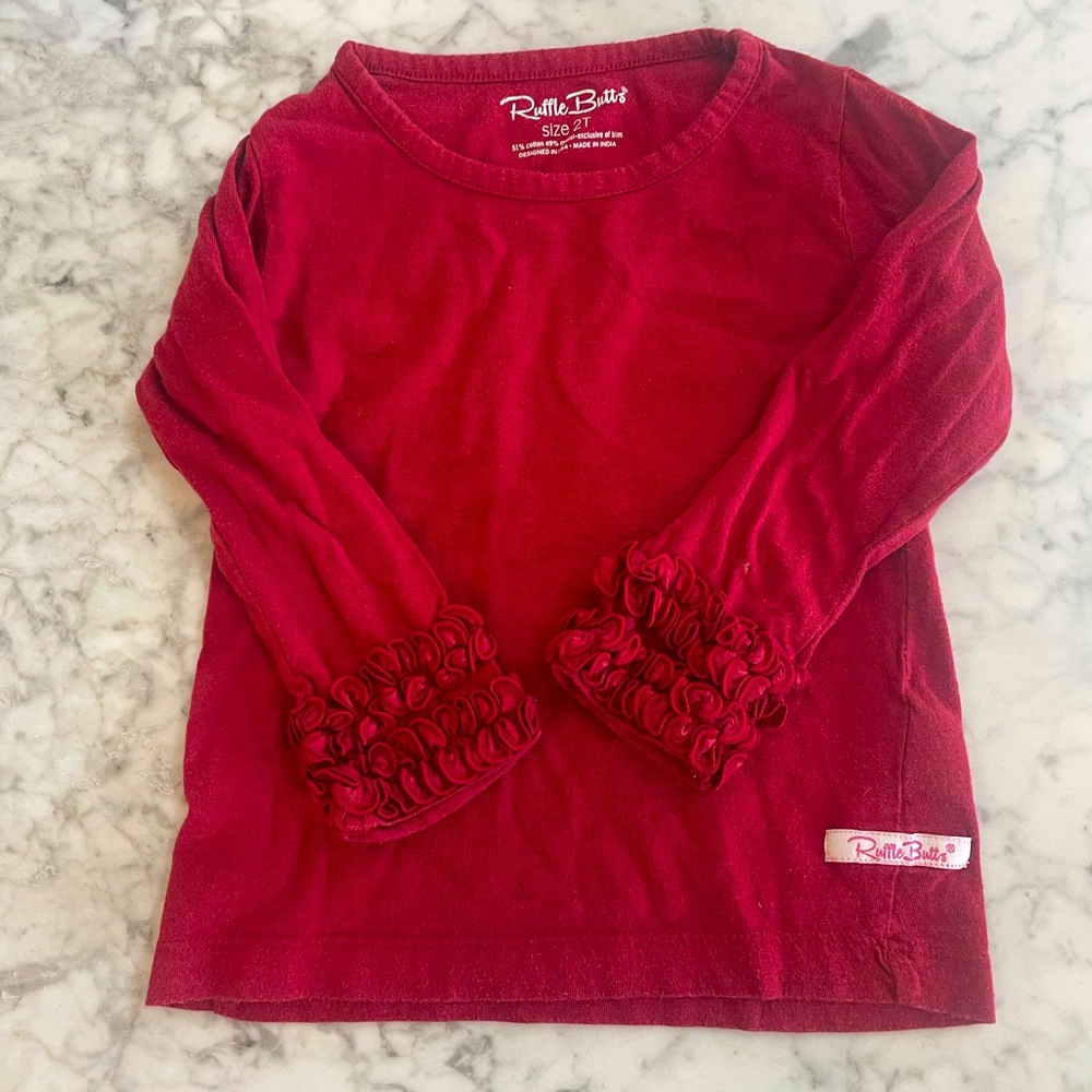 RuffleButts long sleeve ruffle shirt. Size 2T